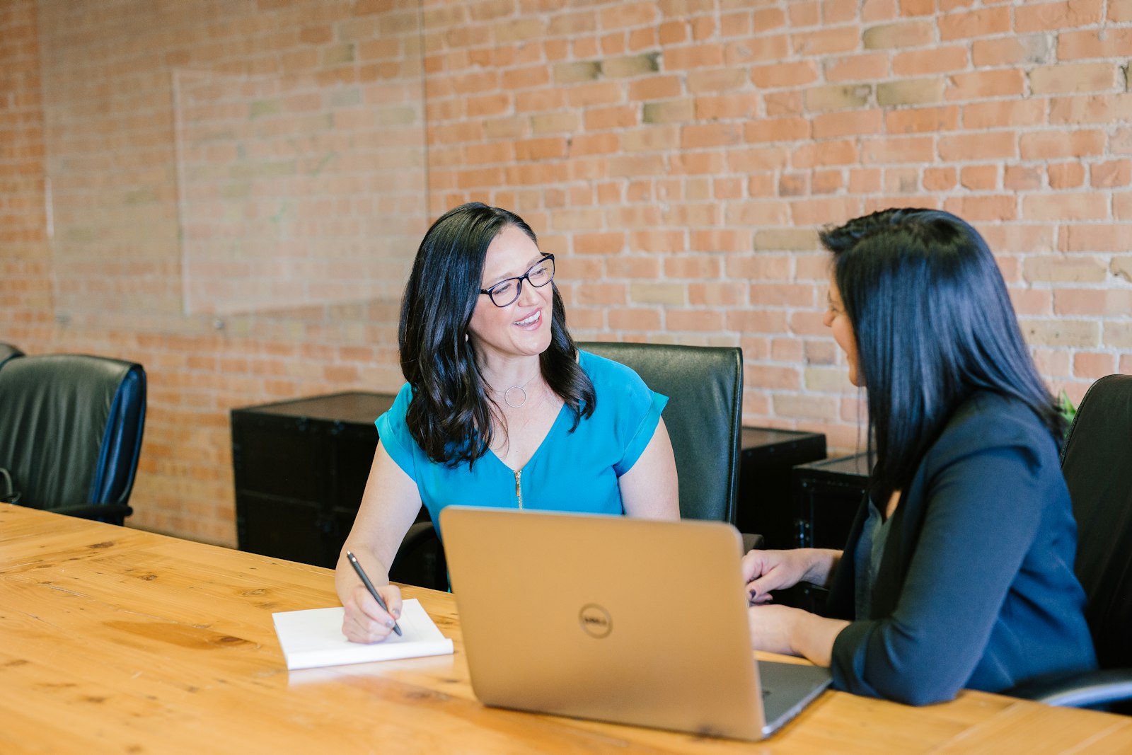 A consultant on a video call with a web entrepreneur